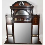 A late Victorian inlaid rosewood overmantel mirror with six bevelled plates, set between inlaid