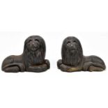 A pair of late 19th century cast iron models of recumbent lions, unmarked, length 18cm (2).Condition