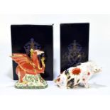 ROYAL CROWN DERBY; two animal form paperweights comprising ‘Welsh Dragon’ 50/950, and ‘Prudence’,