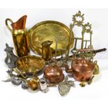 An assortment of late 19th century and later copper and brass items to include an oval twin