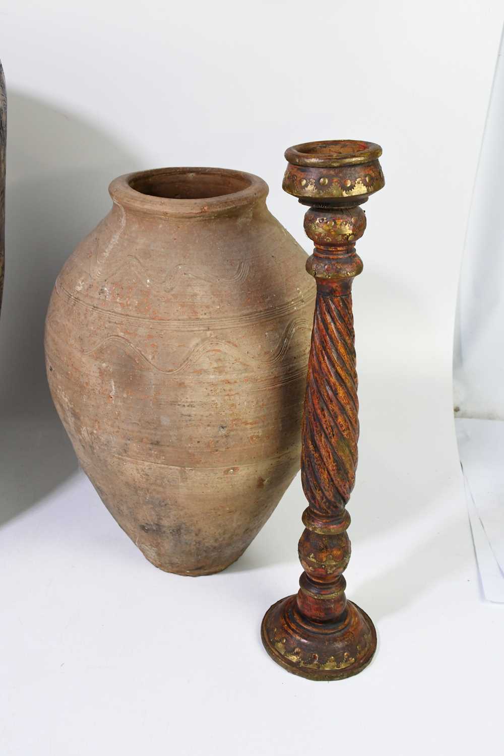 A pair of Indian painted, turned and spiral fluted candle sticks with brass decoration, 51cm, - Image 2 of 4