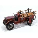 A modern carved wood, metal and composite model of a fire engine, length 70cm.Condition Report: