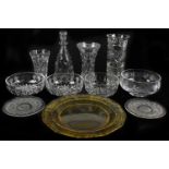 An assortment of cut and moulded glassware, to include vases and bowls.