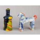 † BEN FOSKER (born 1960); a slip decorated earthenware sculpture of a horse, length 17.5cm, and a