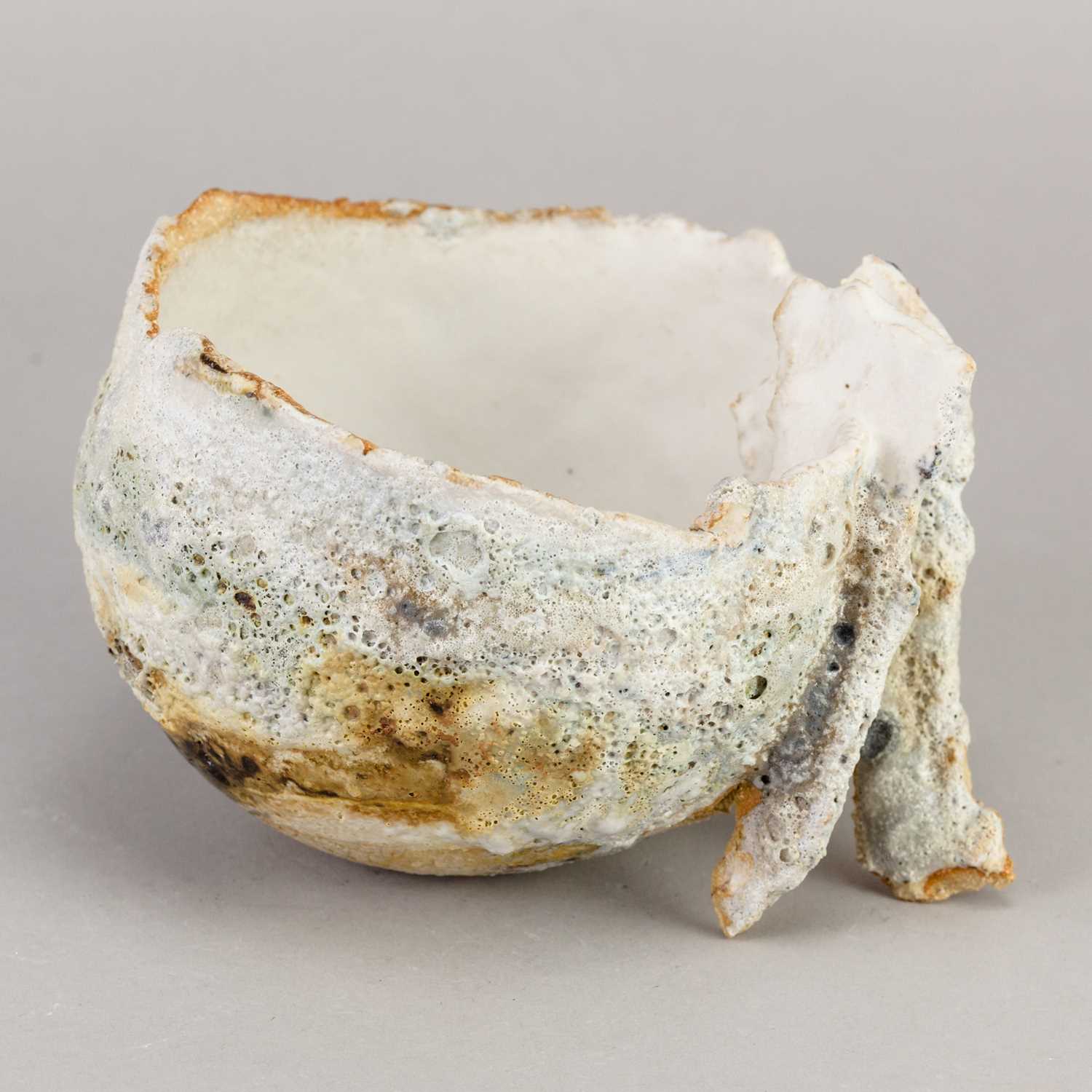 TAMSYN TREVORROW (born 1975); a small grogged stoneware sculptural white rock pool bowl with two