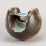 † ANTONIA SALMON (born 1959); a smoke fired and burnished stoneware holding form with turquoise