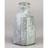 AKIKO HIRAI (born 1970); a small faceted stoneware bottle covered in pitted grey glaze, painted