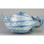 † CAROL McNICOLL (born 1943); an earthenware teapot of eccentric form, incised signature, height