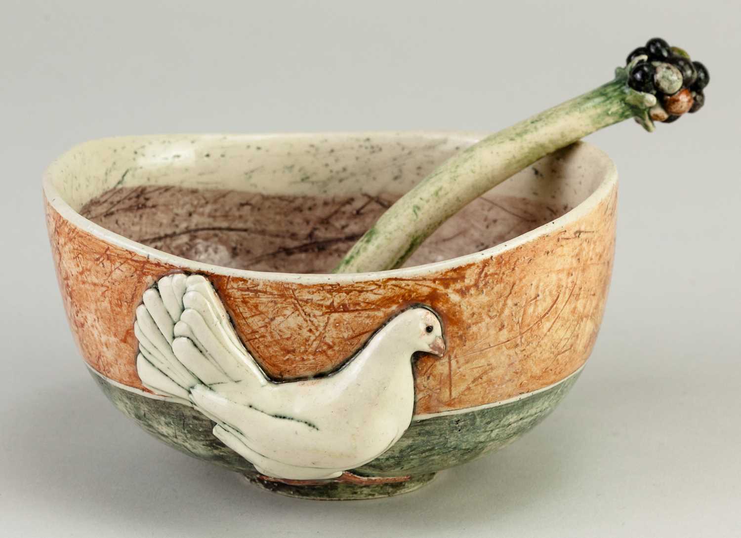 † ANNA LAMBERT (born 1957); an oval earthenware bowl decorated with a sprigged chicken and a small