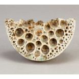 † ALAN WALLWORK (1931-2019); a stoneware wedge form with impressed decoration picked out in green
