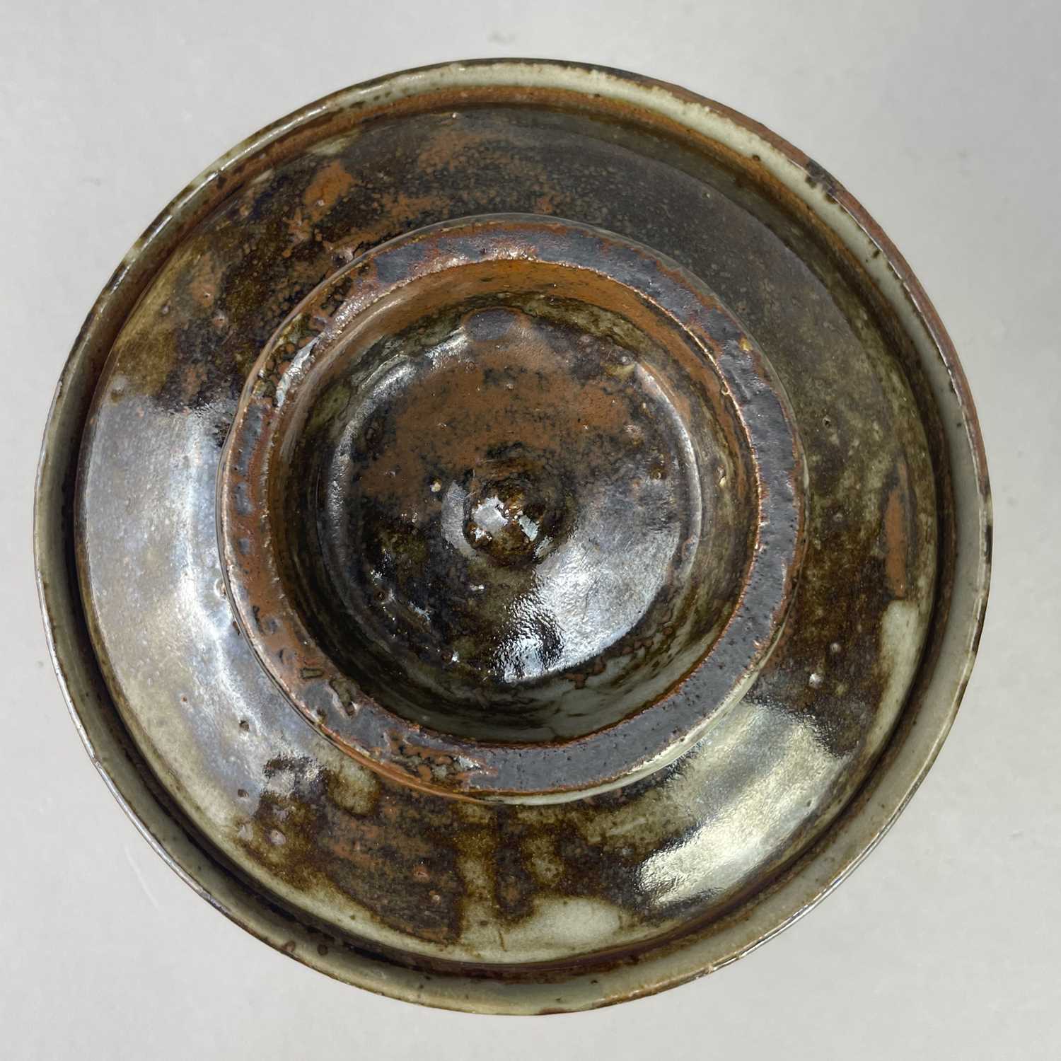Leach Pottery; a stoneware mug covered in tenmoku breaking to kaki glaze, impressed pottery mark, - Image 3 of 6