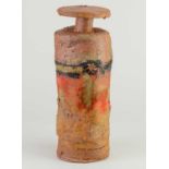 † ROBIN WELCH (1936-2019); a cylindrical stoneware bottle with narrow neck and disc rim covered