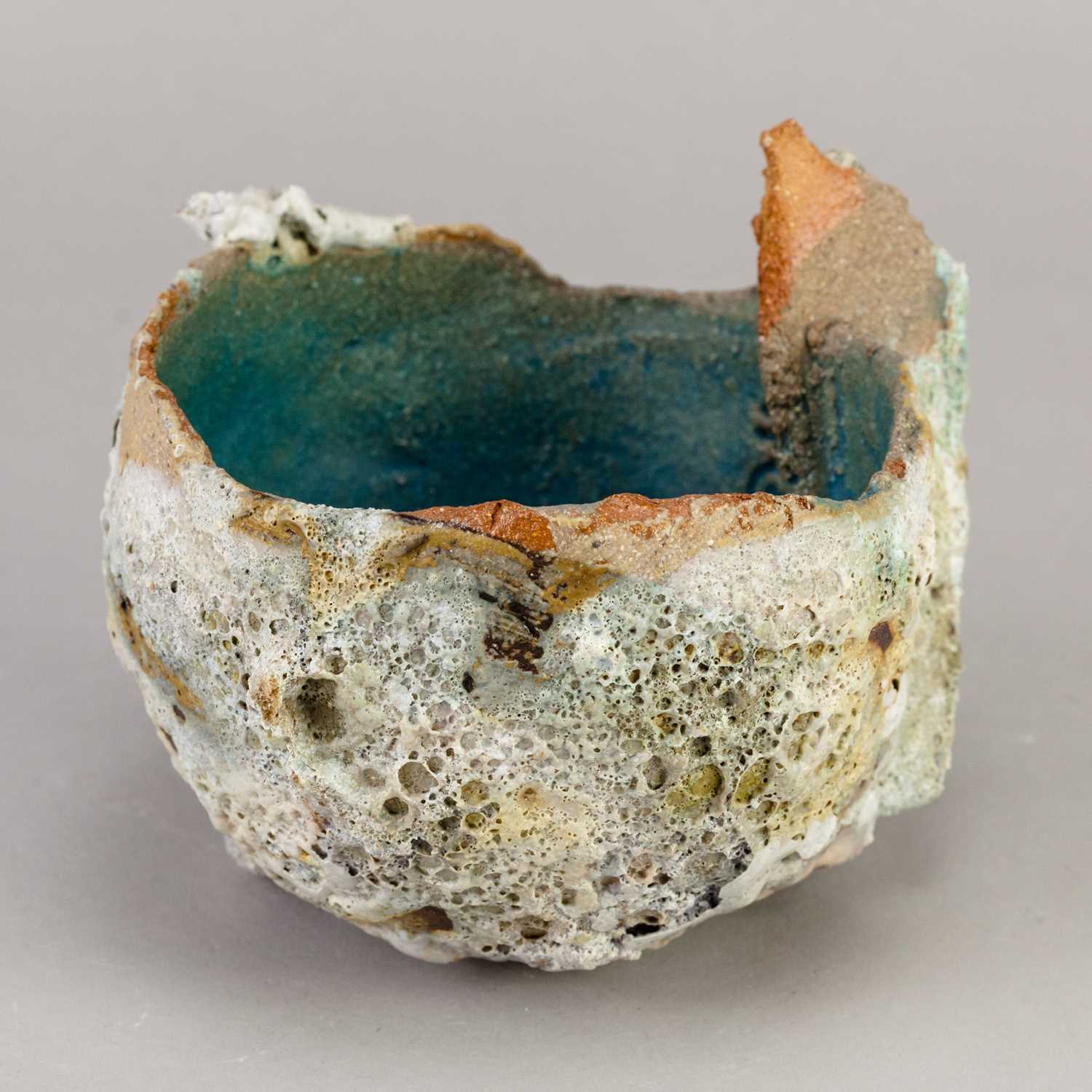 TAMSYN TREVORROW (born 1975); a small grogged stoneware sculptural blue rock pool bowl with one fin,