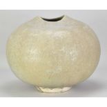 † ABDO NAGI (1941-2001); a large globular stoneware vessel covered in streaky pale green glaze,