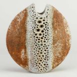 † ALAN WALLWORK (1931- 2019); a stoneware pebble with a vertical band of impressed decoration