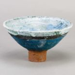 † ROBIN WELCH (1936-2019); a small stoneware pedestal bowl covered in bands of blue and white