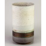 † ROBIN WELCH (1936-2019); a cylindrical stoneware vessel covered in bands of grey, bronze and mauve