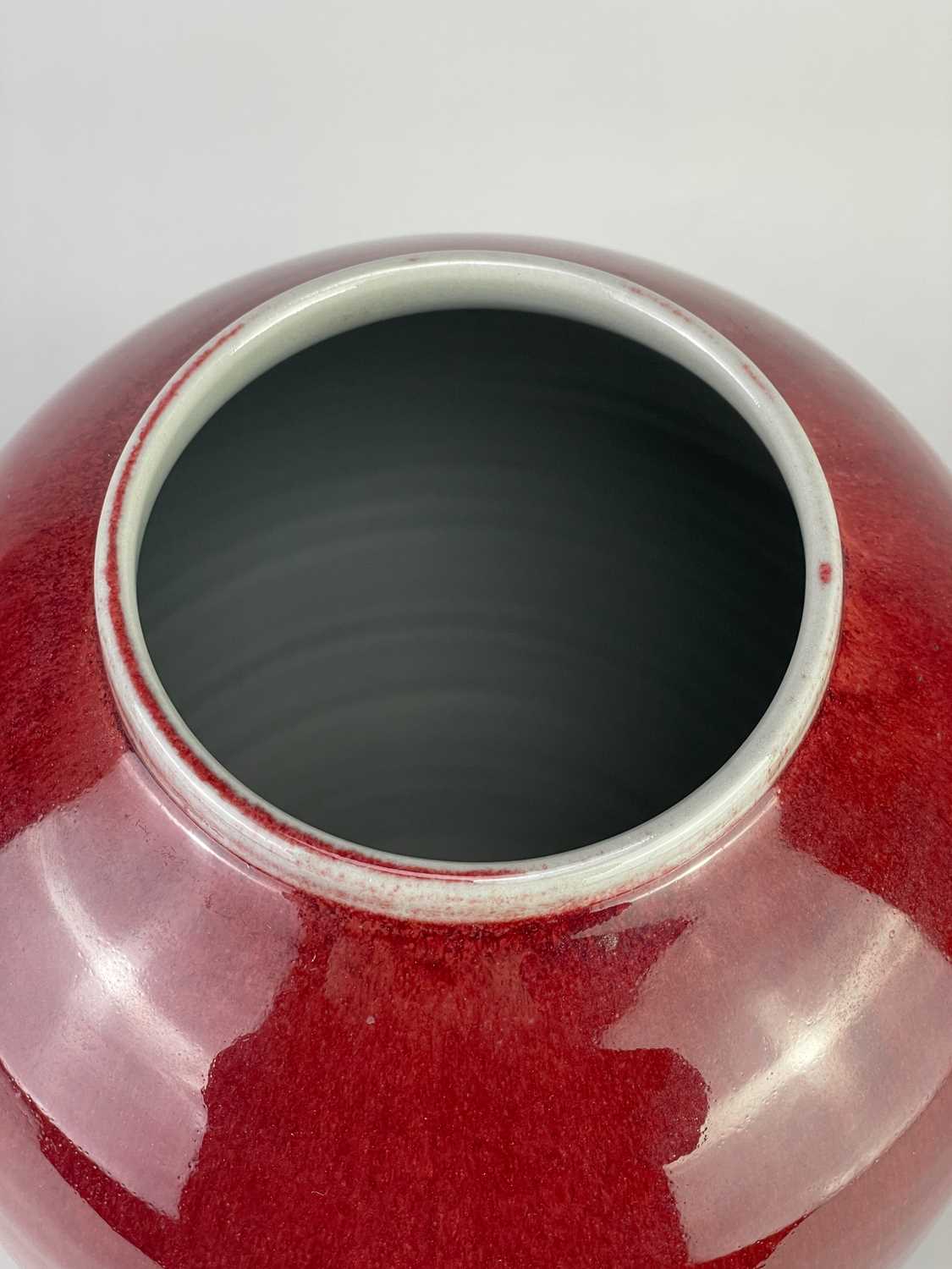 † RUPERT SPIRA (born 1960); a tall stoneware baluster vase covered in copper red glaze with - Image 3 of 4