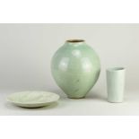 † ALAN BROUGH (1924-2012); a stoneware jar (minus cover) covered in pale green glaze, impressed AB