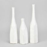 AKIKO HIRAI (born 1970); a set of three stoneware Morandi bottles covered in white glaze, incised AH