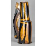 † RICHARD PHETHEAN (born 1953); a slip decorated earthenware articulated jug form with torn edged