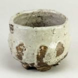 CHARLES BOUND (born 1939); a wood fired stoneware chawan partially covered in grey glaze, diameter