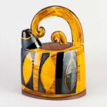† RICHARD PHETHEAN (born 1953); a slip decorated earthenware teapot, painted RP mark, height 22.5cm.
