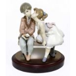 LLADRO; a 10th anniversary figure 'Ten and Growing', no 7635, height 19.5cm.Condition Report: Good
