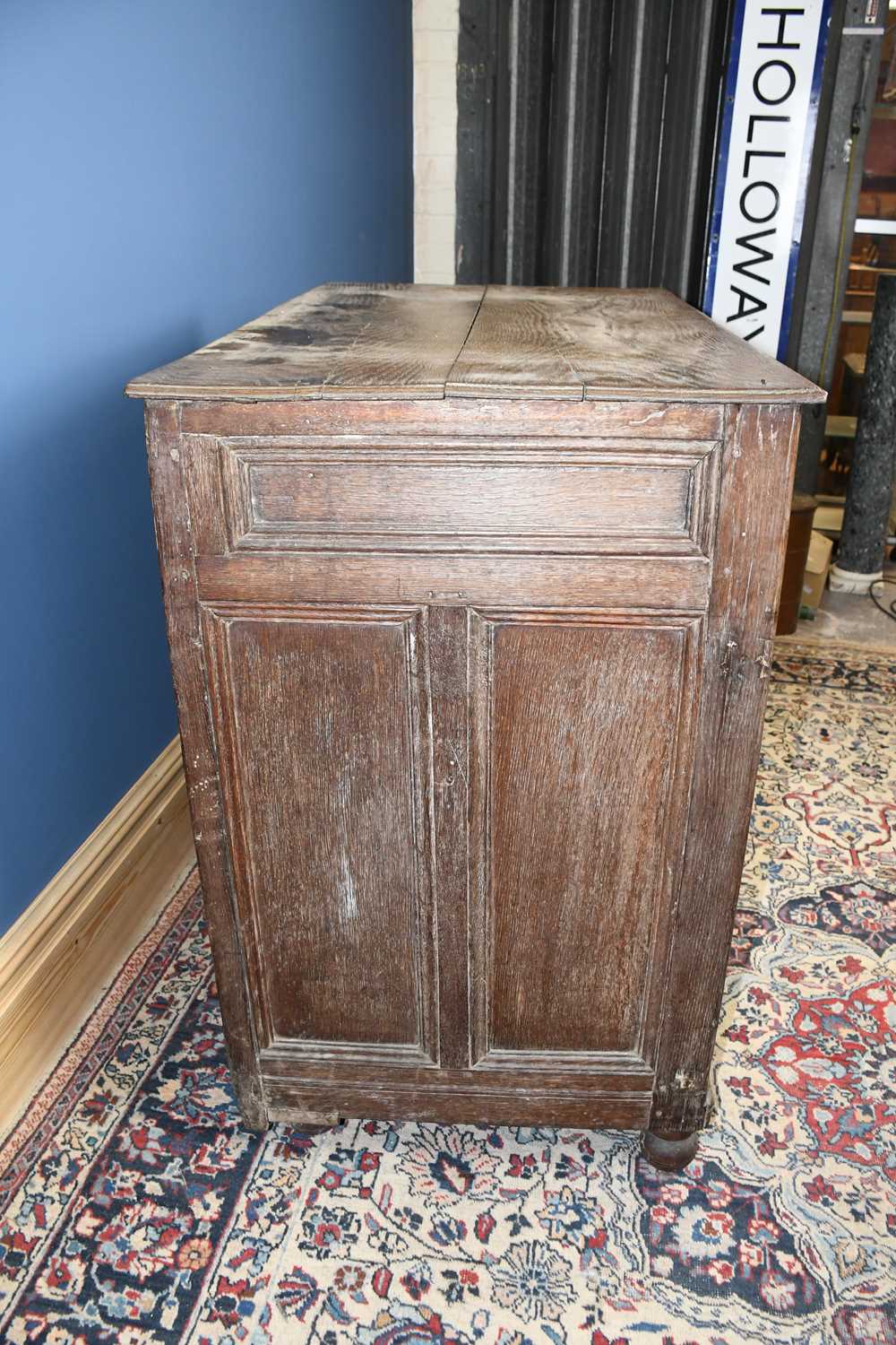 A 17th century and later oak chest, with four fielded panelled long drawers, on turned feet, - Image 4 of 5