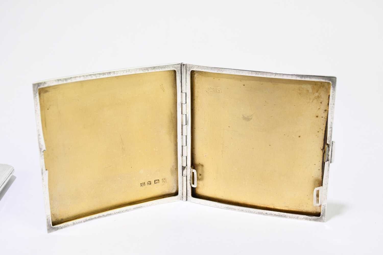 CLARK & SEWELL; a George VI hallmarked silver cigarette case of shaped rectangular with engine - Image 3 of 4