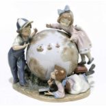 LLADRO; a figure group of children around a globe, 'Voyage of Columbus', additionally signed to