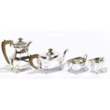 VINERS; a George V hallmarked silver four piece tea service with panelled decoration, Sheffield