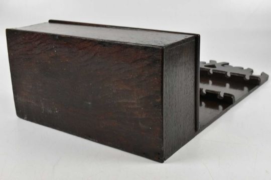 A Georgian oak spoon rack, with two applied panels, with fourteen divides, above a cupboard door, - Image 4 of 4