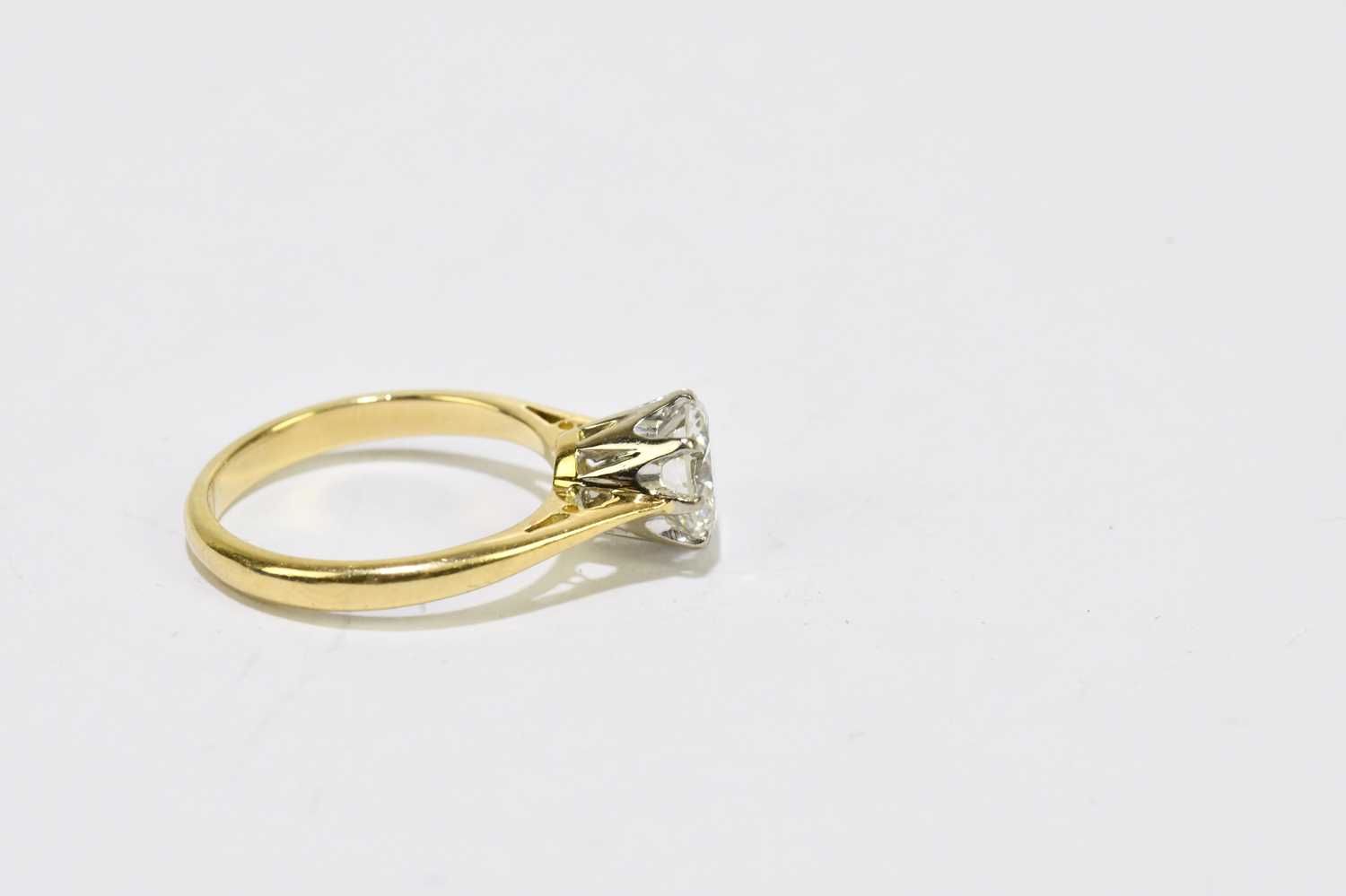 An 18ct yellow gold and diamond solitaire ring, the round brilliant cut eight claw set stone approx. - Image 4 of 5