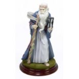 LLADRO MILLENIUM INSPIRATION; Father Time, height 28cm, with a circular base.Condition Report: The