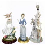 LLADRO; figure groups and a lamp, the lamp modelled with two ballet dancers, height 44cm, a fairy