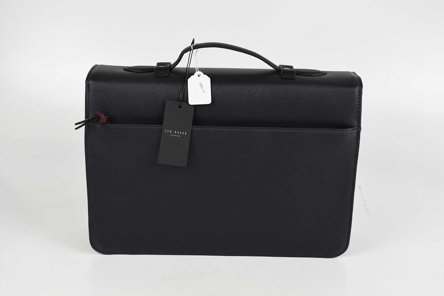 TED BAKER; an unused navy blue faux leather satchel, with front flap and two silver tone buckle - Image 3 of 5