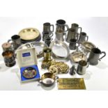 A collection of 18th century and later pewter, to include various plates and mugs, also a small