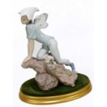 LLADRO; a Privilege figure, 'Prince of the Elves', 7690, height 29cm, on oval stand.Condition