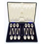 JOSIAH WILLIAMS & CO; a cased set of twelve Edward VII hallmarked silver teaspoons, with engraved