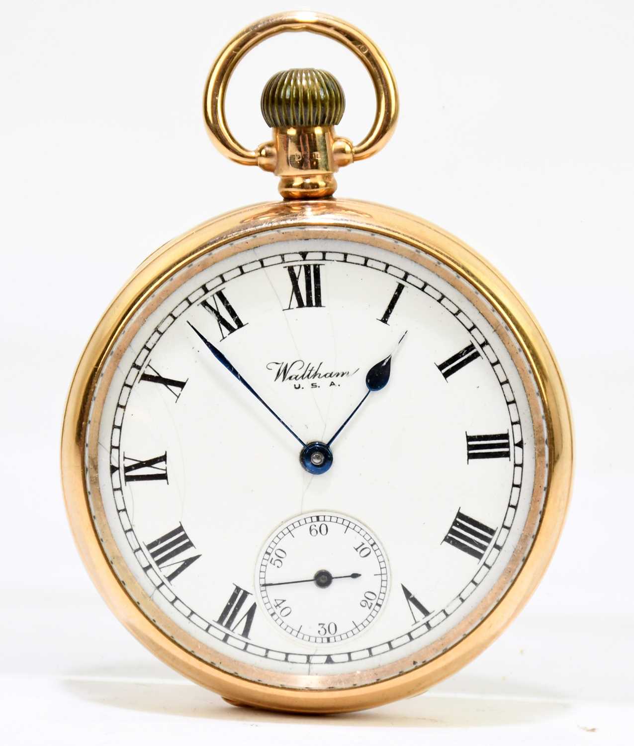 WALTHAM; a 9ct yellow gold cased crown wind open face pocket watch, the enamel dial set with Roman