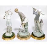 LLADRO; a figure of a male and female golfer, tallest 28cm, with a Valencia figure of a female