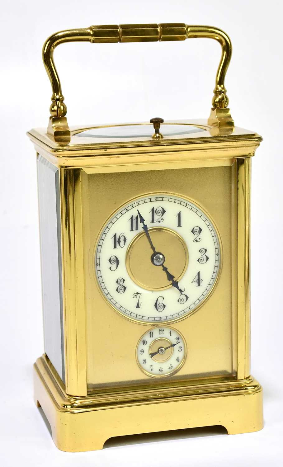 A circa 1900 French brass repeating carriage clock with Arabic numerals to the chapter ring set