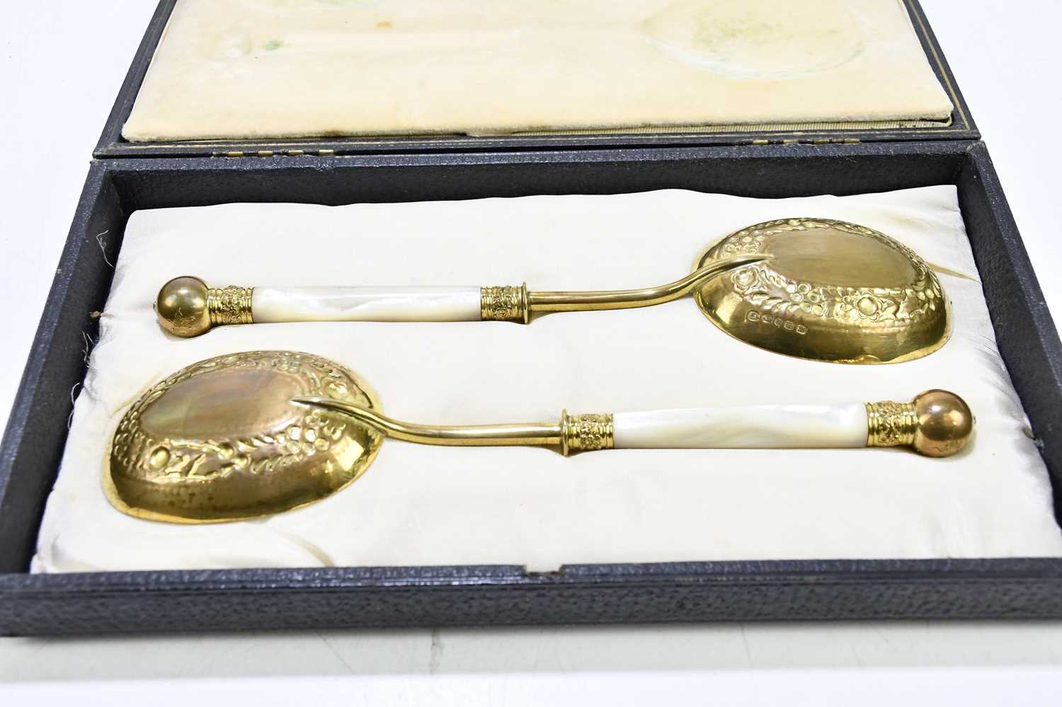 A pair of late Victorian gilt plated serving spoons, with mother of pearl handles, length 23.5cm, - Image 2 of 4