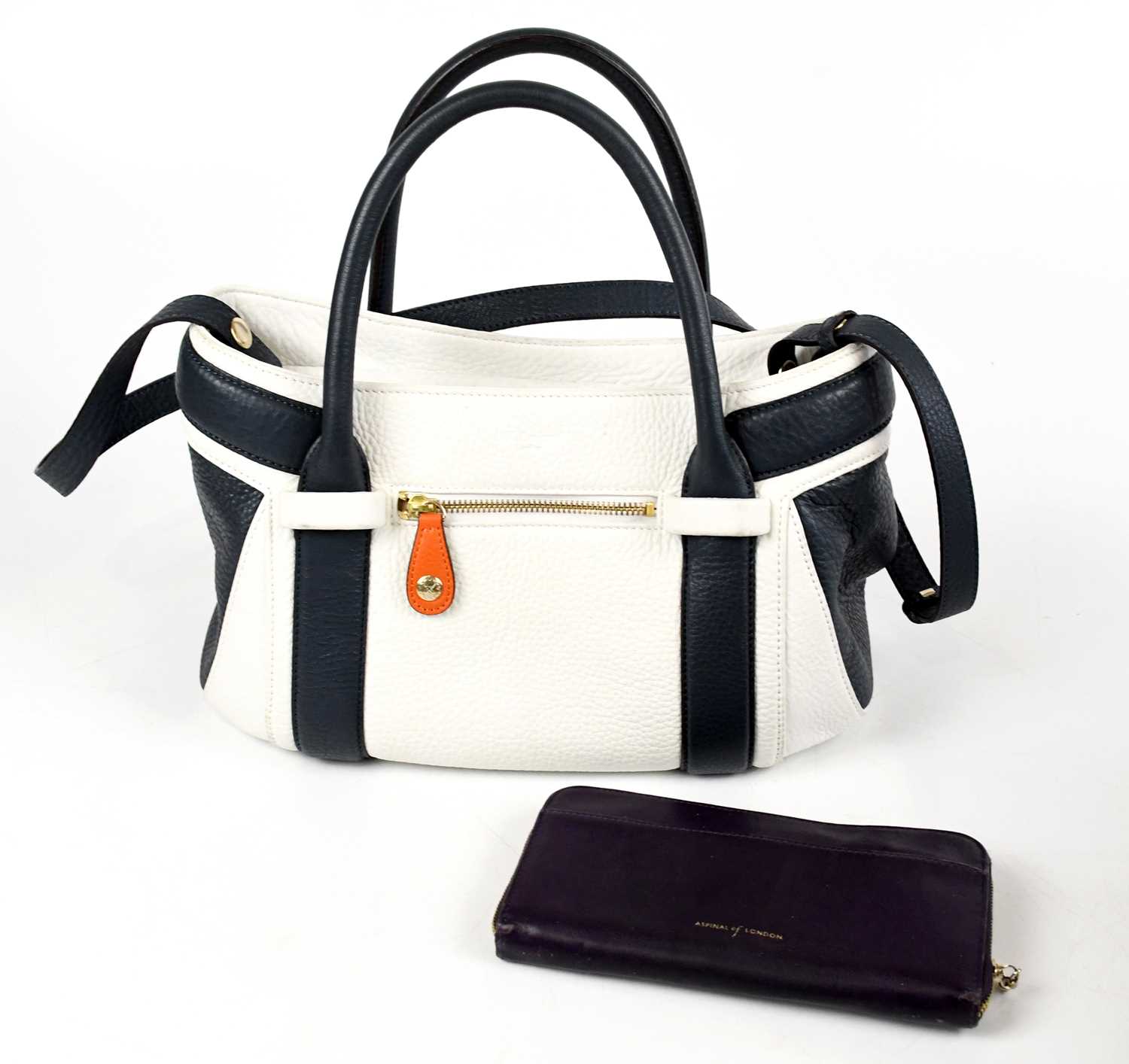 L.K BENNETT, LONDON; a white pebbled leather classic-style handbag trimmed with navy blue leather