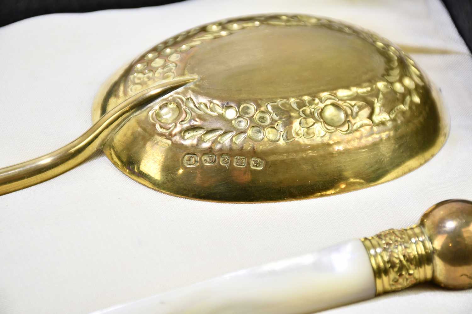 A pair of late Victorian gilt plated serving spoons, with mother of pearl handles, length 23.5cm, - Image 3 of 4