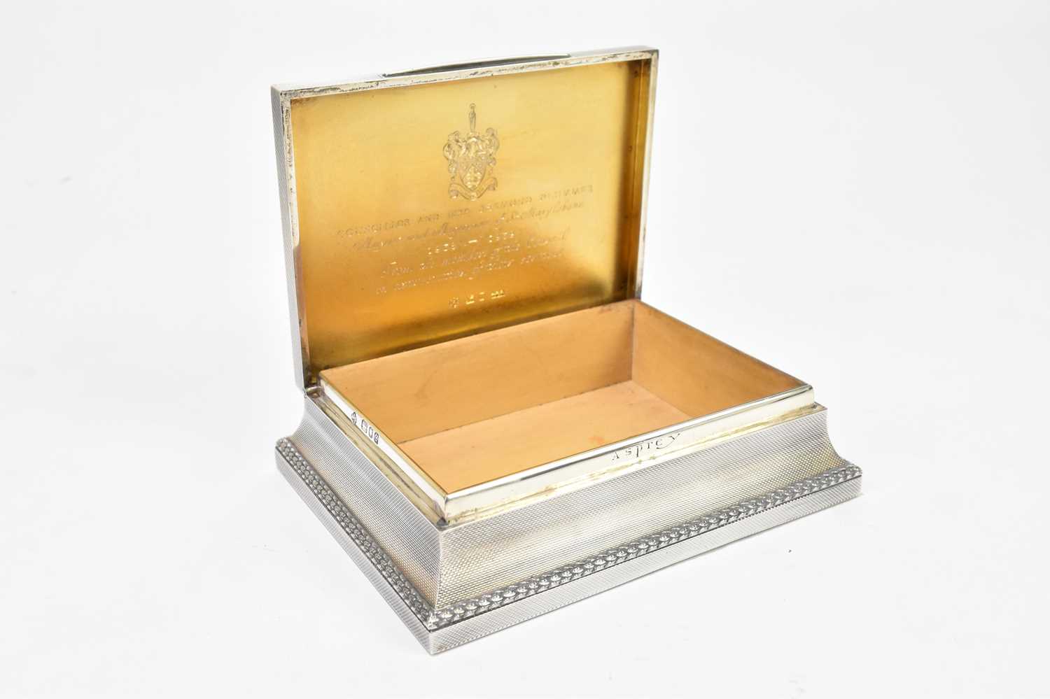 ASPREY & CO; an Elizabeth II hallmarked silver cigarette box of shaped rectangular form, with cast - Image 3 of 8