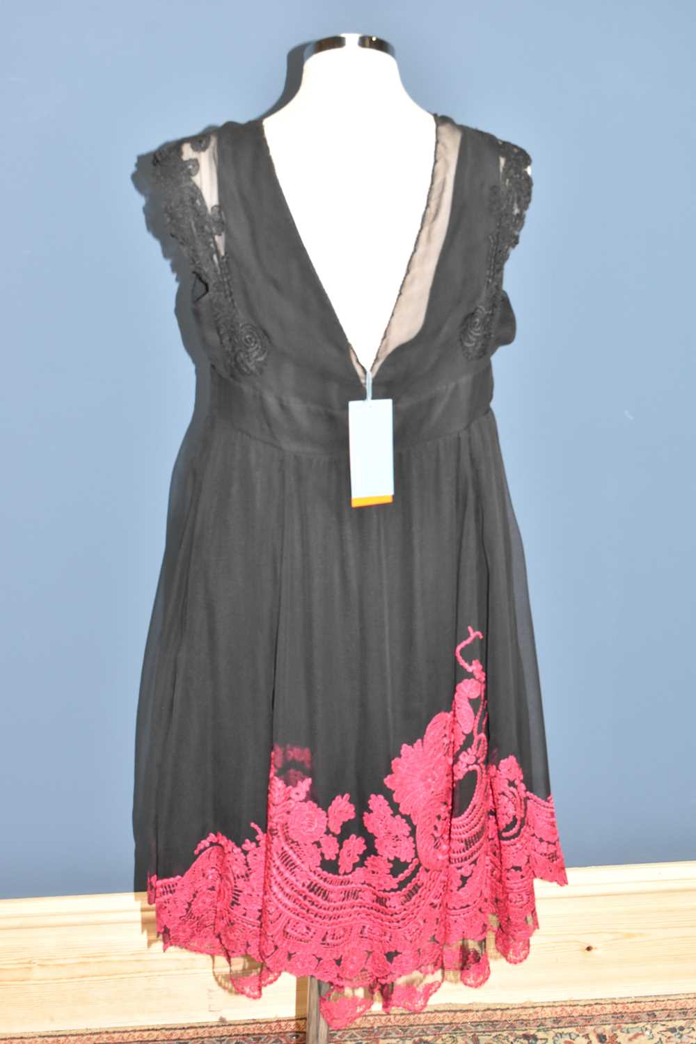 KAREN MILLEN; a black 100% silk evening dress, unused with original tags, with pink embroidery to - Image 2 of 3