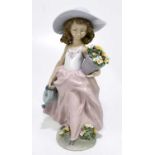 LLADRO; a figure of a girl with a basket of flowers, 'A wish come true', height 23.5cm.Condition