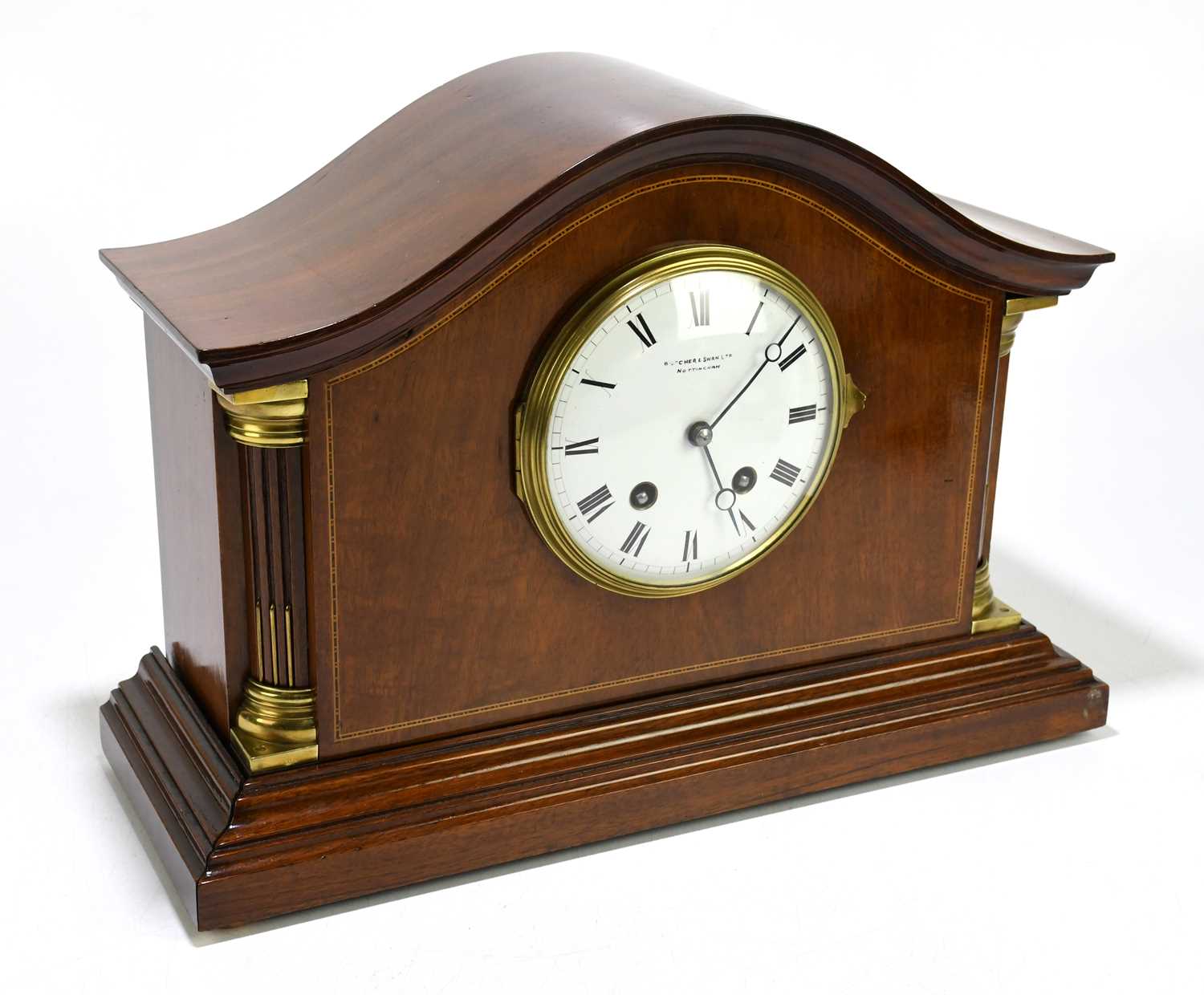 BUTCHER & SWAN LTD, NOTTINGHAM; an Edwardian inlaid mahogany mantel clock, the hat shaped top